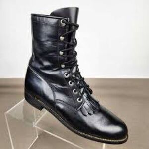 Justin kiltie black leather boots with a lace-up closure